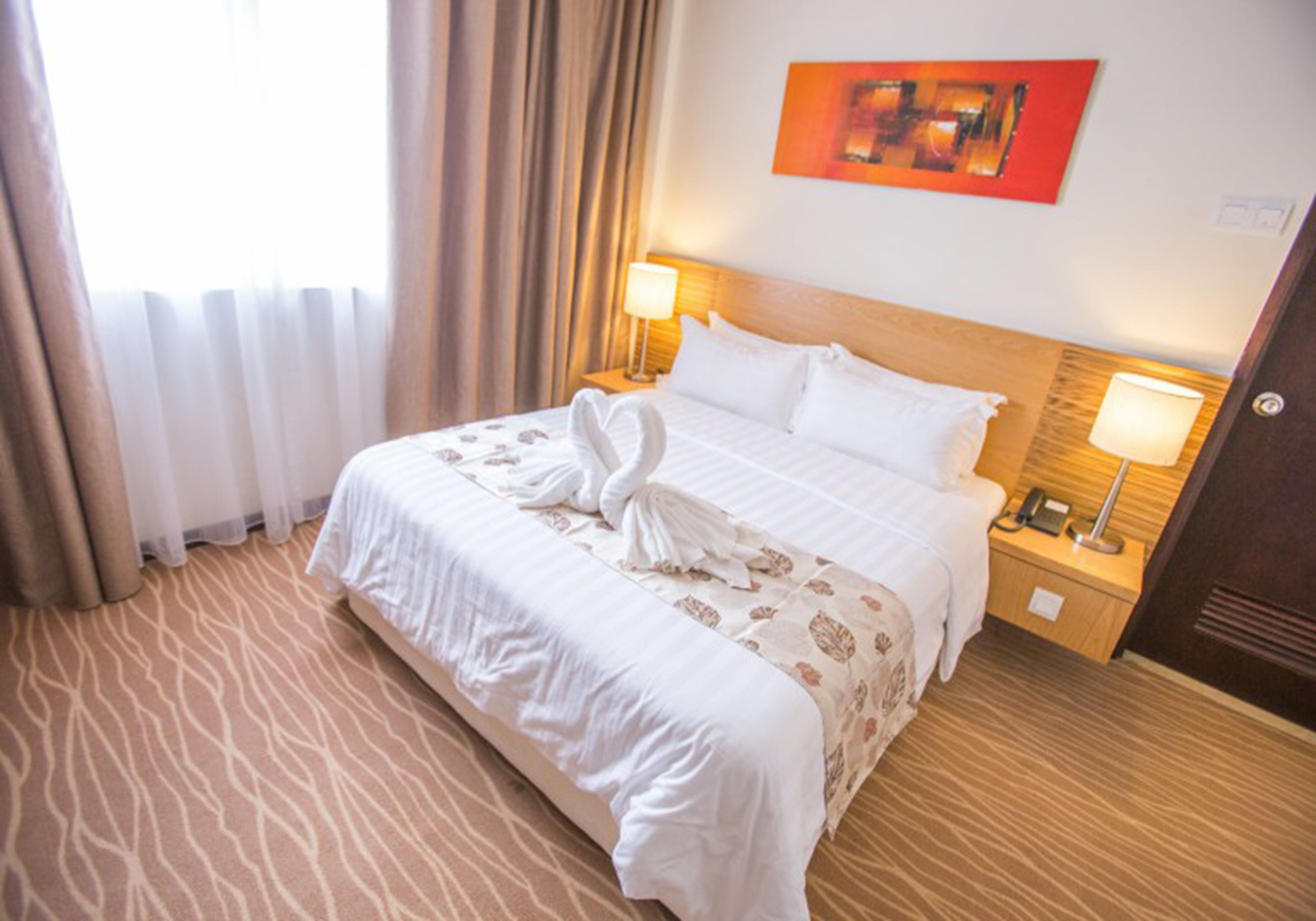 superior queen room | in-room safe, desk, blackout curtains, soundproofing