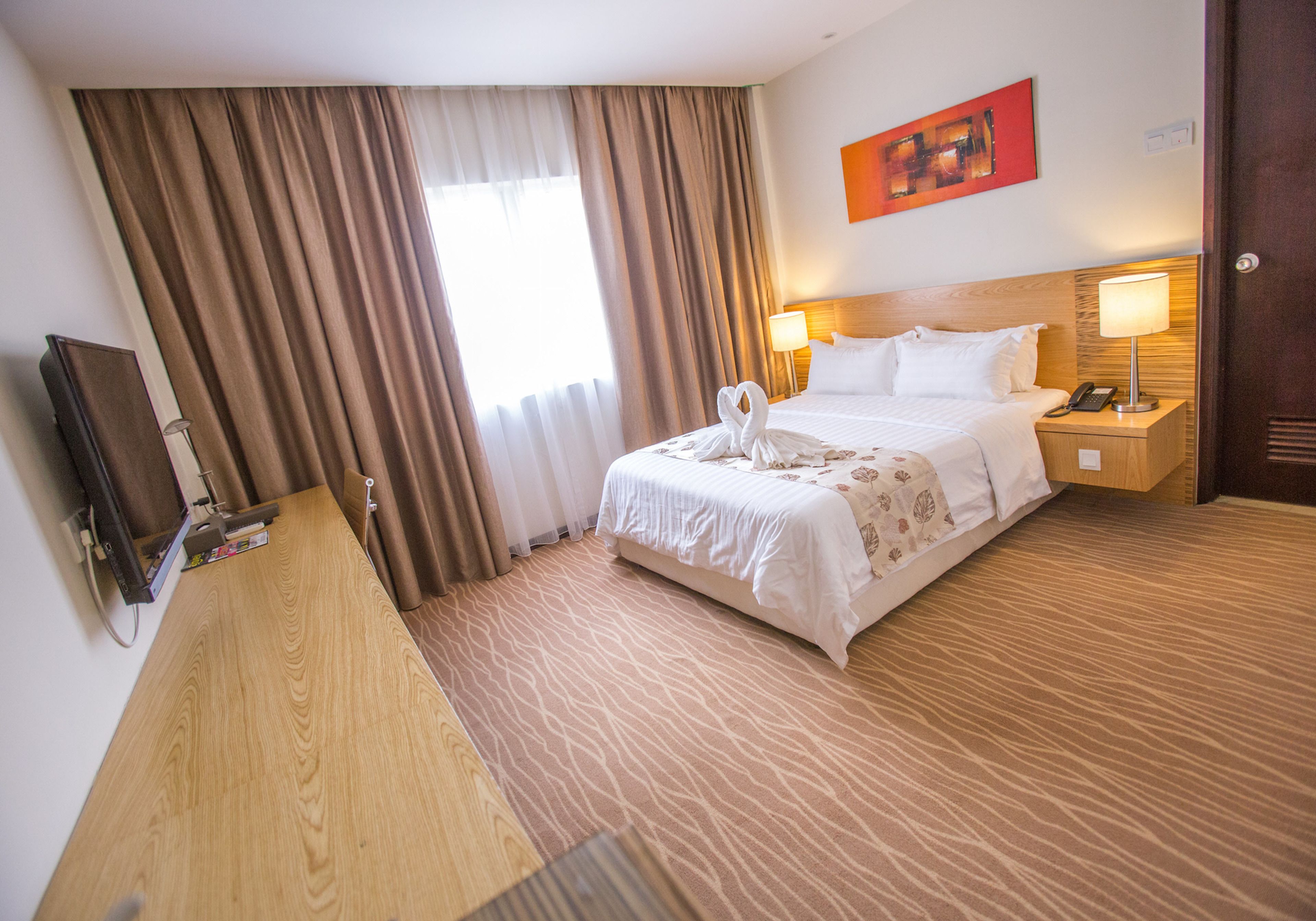 superior queen room | in-room safe, desk, blackout curtains, soundproofing