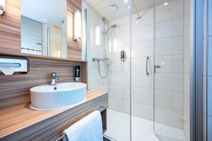 Shower, free toiletries, hair dryer, towels