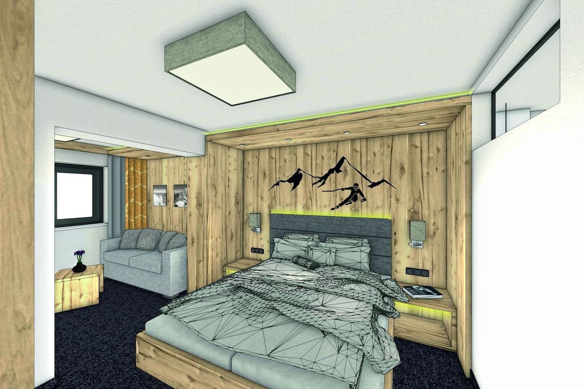 Ein modernes Schlafzimmer mit einem Holz-Kopfteil, einer Bettdecke mit geometrischem Muster und einer Wandleuchte.