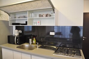 Appartamento, 2 camere da letto | Cucina privata | Frigorifero, microonde, piano cottura, bollitore elettrico