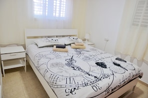 Apartamento, 2 quartos | 2 quartos, ferros/tábuas de passar roupa, Wi-Fi de cortesia