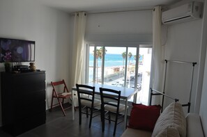 Apartment, 1 Bedroom, Beachfront | Living area | Flat-screen TV - Isra Home Apartments Ben Gurion 81 (Bat Yam)