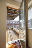 Apartamento luxo, 2 quartos | Terraço/pátio