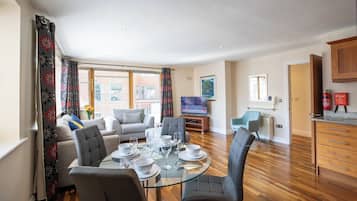 Deluxe Apartment, 2 Bedrooms | Living area | 42-inch LCD TV with cable channels, TV