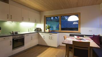 Apartment, 2 Bedrooms | Living area | Flat-screen TV