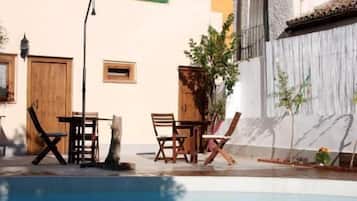 Seasonal outdoor pool, pool umbrellas, pool loungers