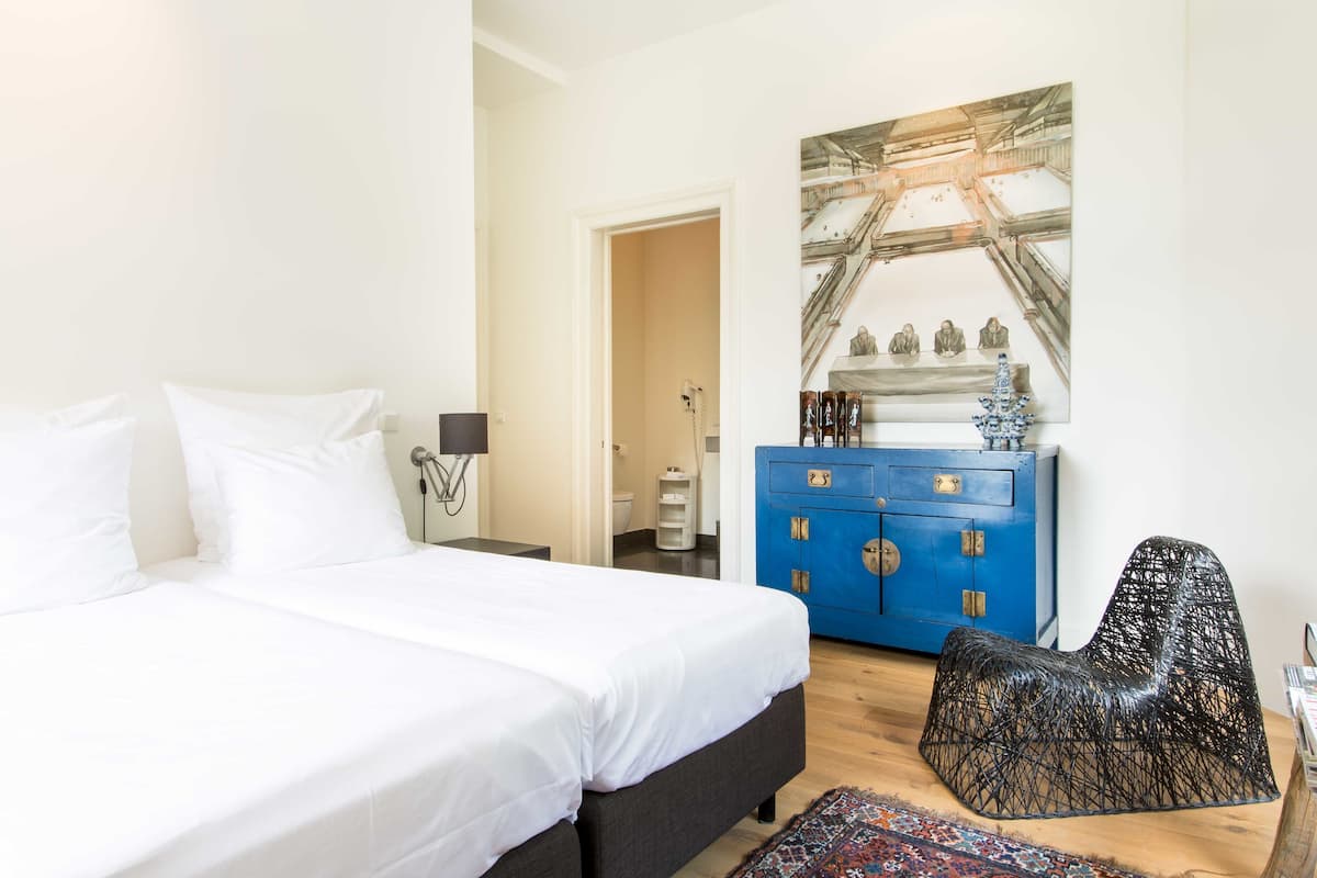 Deluxe-Doppelzimmer, Balkon, Eckzimmer | 1 Schlafzimmer, individuell dekoriert, individuell eingerichtet