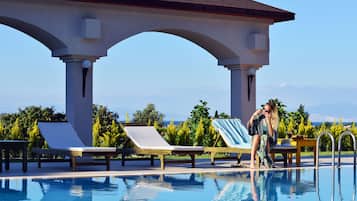 Outdoor pool, free cabanas, pool umbrellas