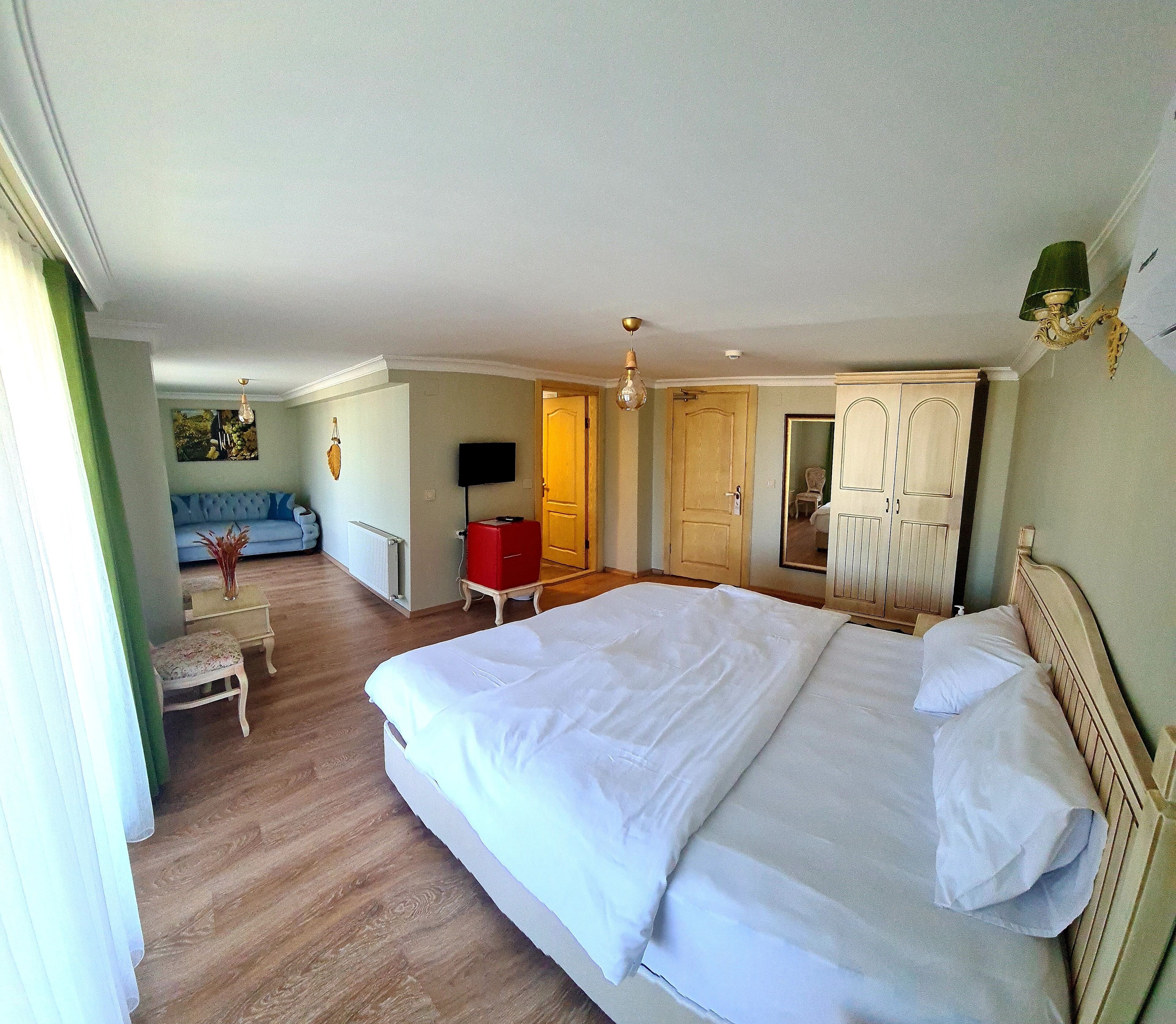 Suite, 1 chambre, vue mer | Literie de qualité supérieure, minibar, coffres-forts dans les chambres