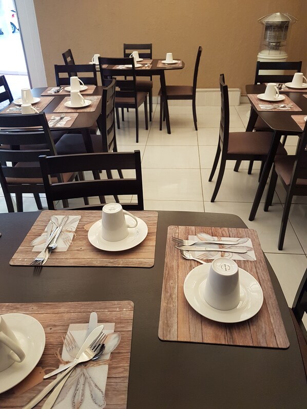Enjoy meals in a well-maintained dining area with comfortable seating and modern amenities.