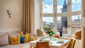 Royal Apartment, 1 Bedroom, Kitchenette, City View | Living room | Flat-screen TV