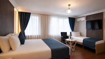 Deluxe Room | Egyptian cotton sheets, premium bedding, minibar, blackout drapes