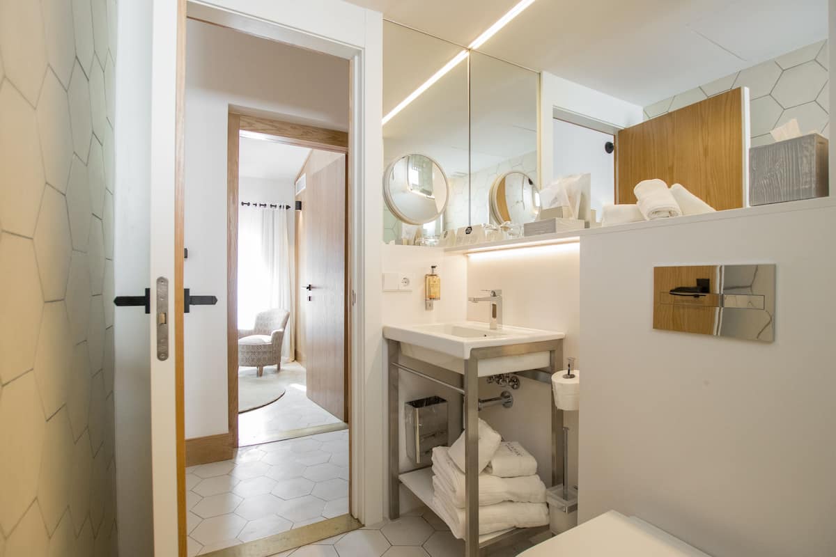 shower, rainfall showerhead, designer toiletries, hair dryer