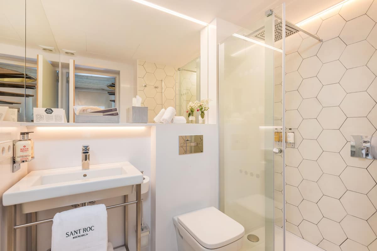 Bathroom | Shower, rainfall showerhead, designer toiletries, hair dryer