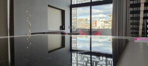 Design Loft, Pool Access (Red) | Living area | 50-inch flat-screen TV with digital channels, Smart TV, heated floors
