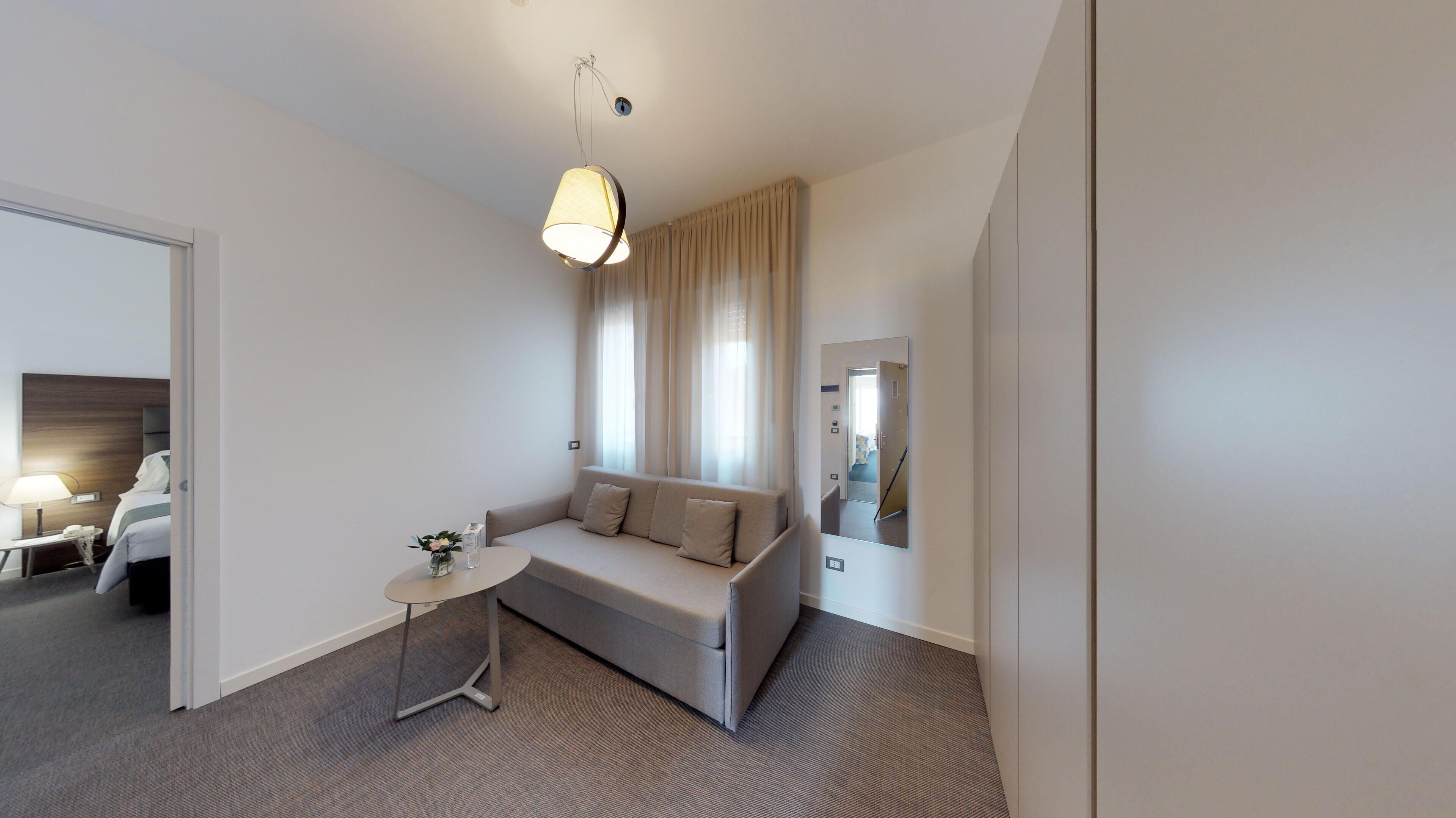 basic quadruple room | down duvets, minibar, desk, free wifi