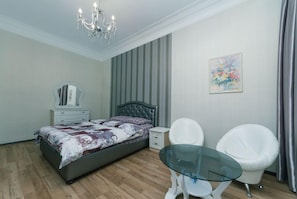Apartment, 1 Bedroom | Desk, iron/ironing board, free WiFi, bed sheets
