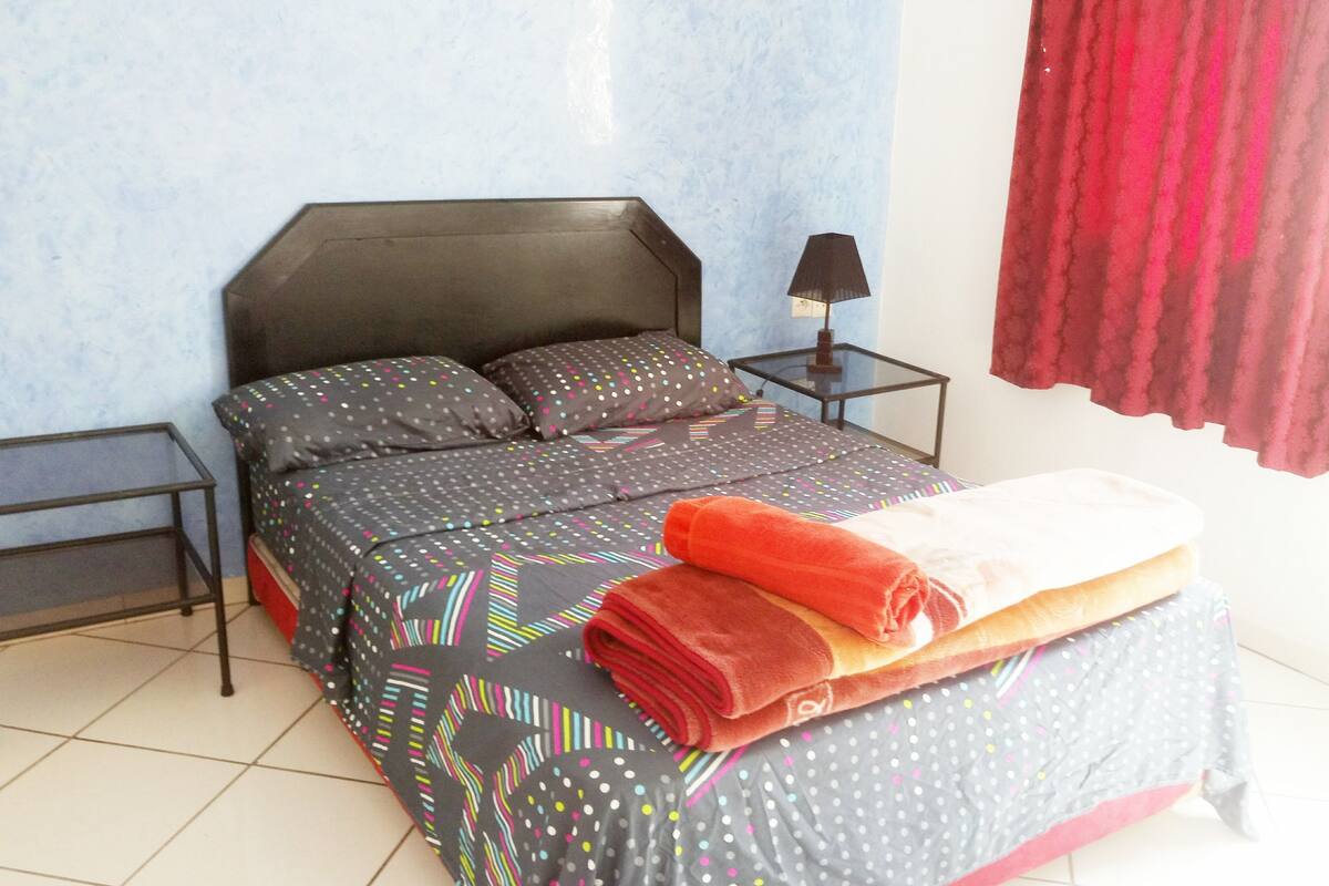 Appartement, 2 chambres | 1 chambre, coffres-forts dans les chambres, rideaux occultants
