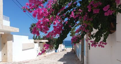 Partie de pittoresque maison en bord de mer