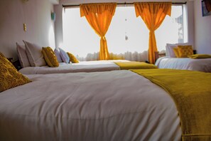 Quadruple Room, Multiple Beds | Down duvets, minibar, desk, laptop workspace - Hotel Royal Suite (Manizales)