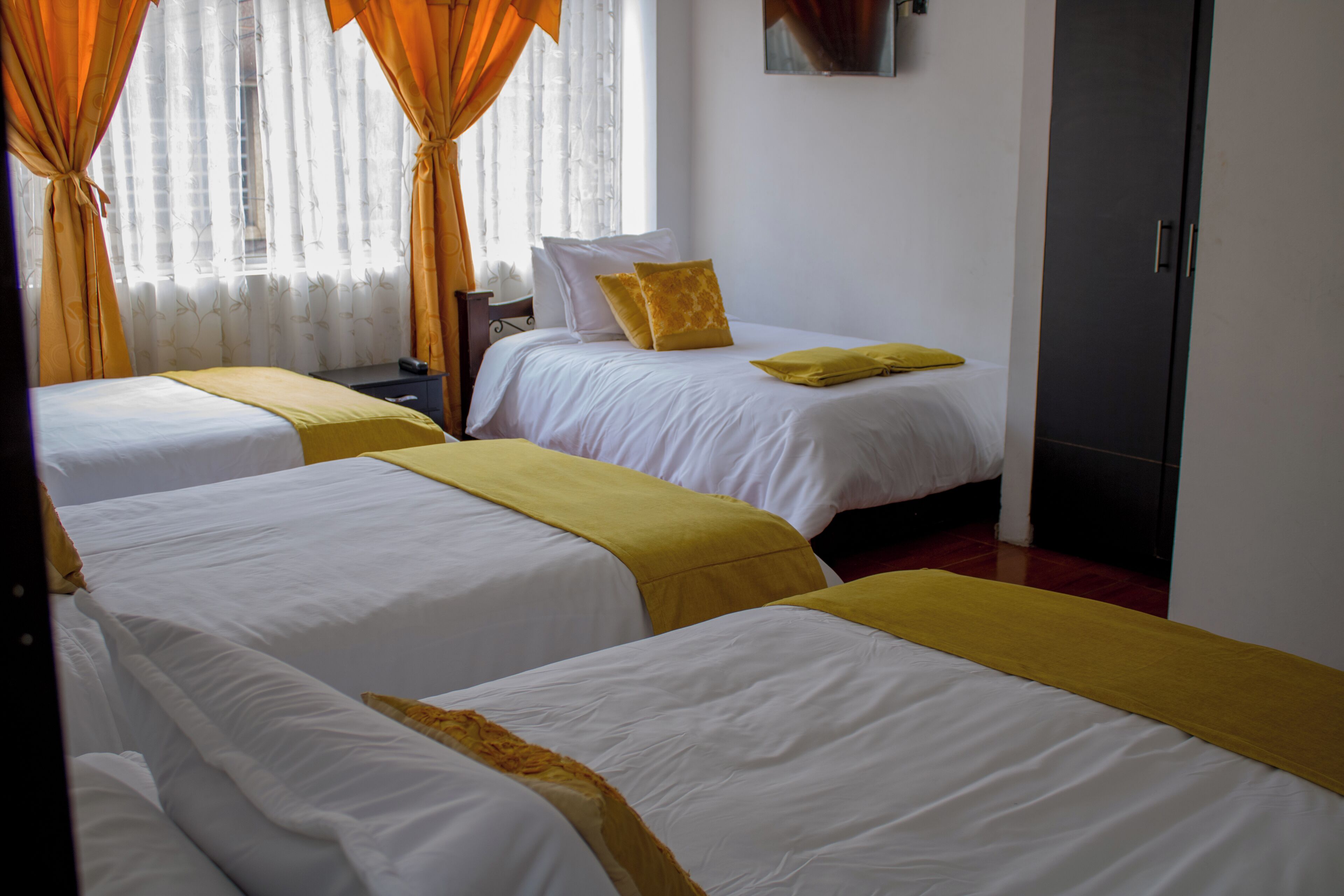 Quadruple Room, Multiple Beds | Down duvets, minibar, desk, laptop workspace