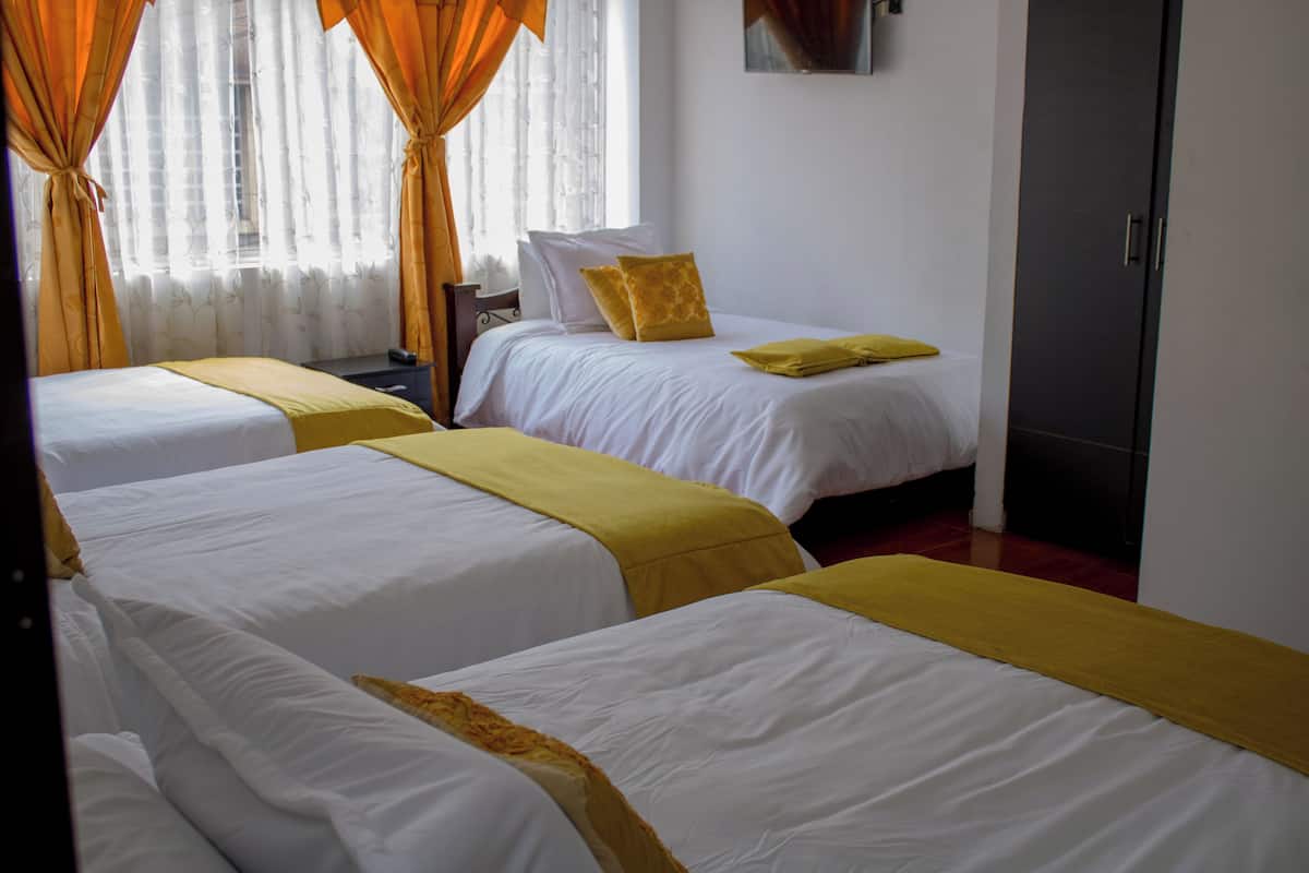 Quadruple Room, Multiple Beds | Down duvets, minibar, desk, laptop workspace