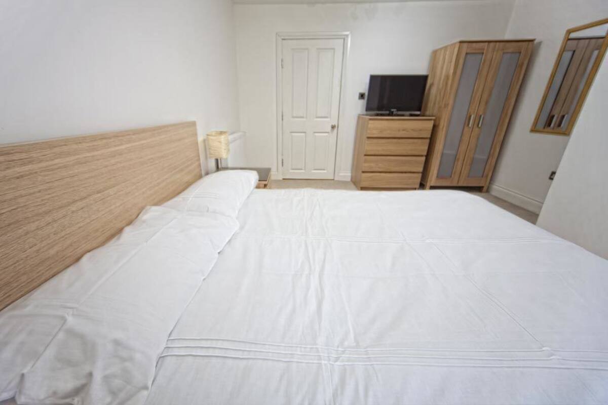 Double Room | Iron/ironing board (on request), bed sheets
