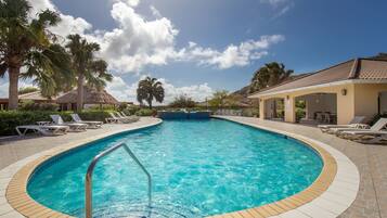 Outdoor pool, pool umbrellas, sun loungers