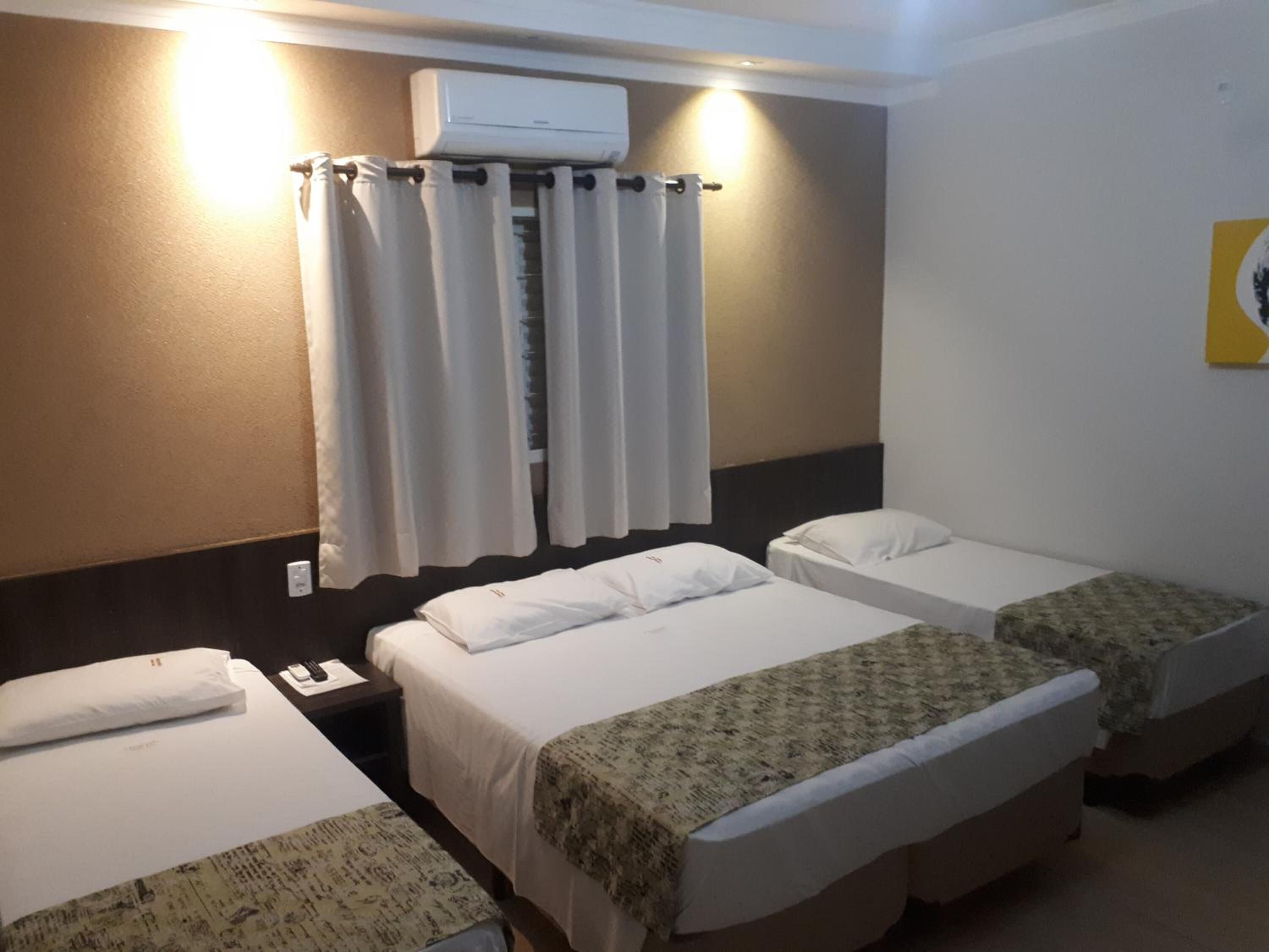 minibar, desk, blackout curtains, iron/ironing board