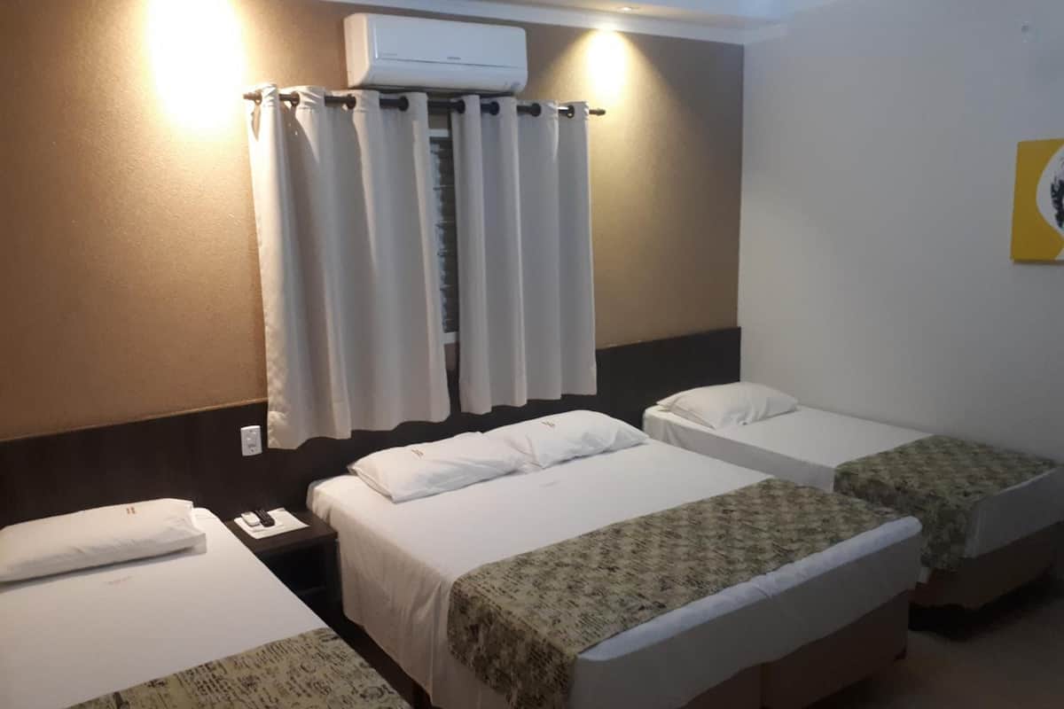 minibar, desk, blackout curtains, iron/ironing board