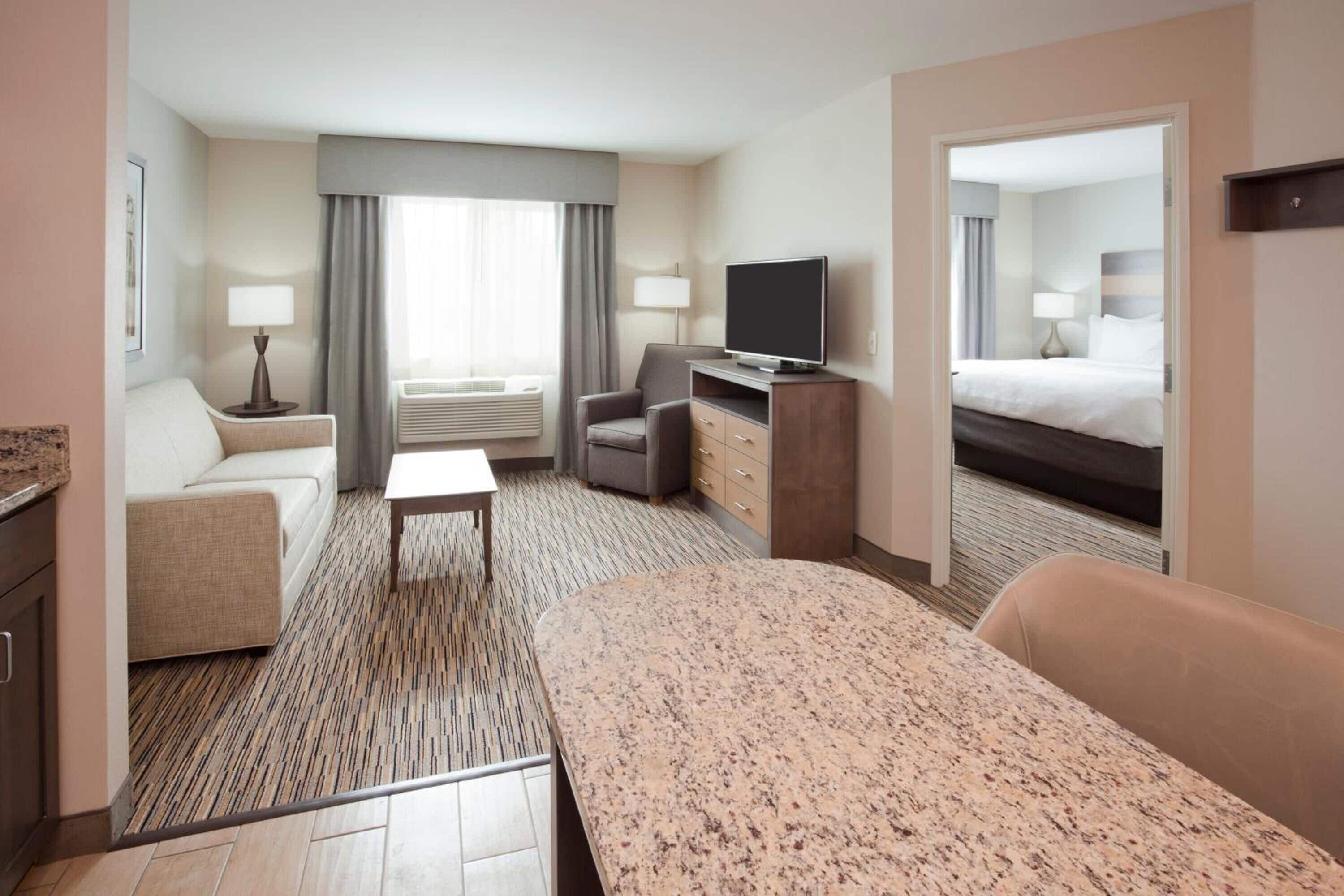 suite, 1 king bed with sofa bed | desk, laptop workspace, iron/ironing board, free wifi