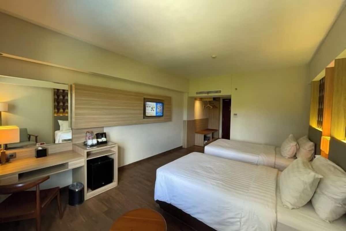 Roba de llit d'alta qualitat, minibar i caixa forta a l'habitació