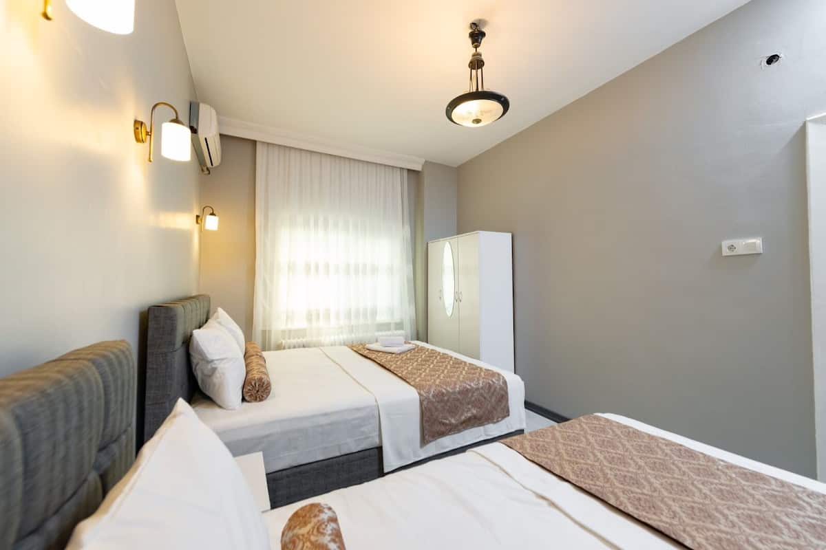 Appartement Familial, 2 chambres | 1 chambre, literie de qualité supérieure