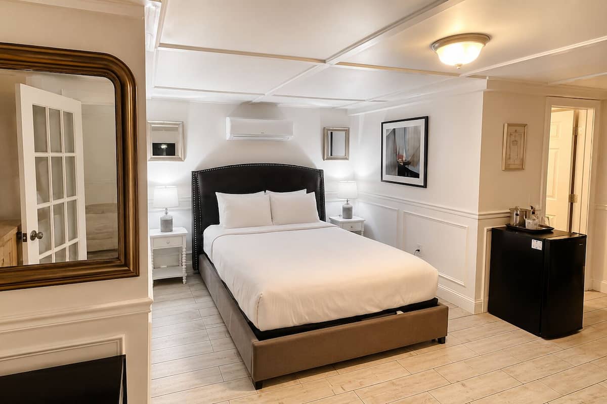 Basement Queen Room | Iron/ironing board, bed sheets