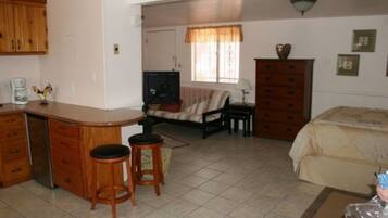 Room, Private Bathroom (Petite Cottage) | Desk, iron/ironing board, free WiFi