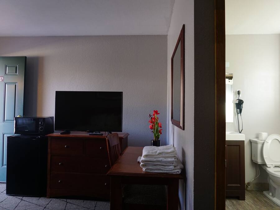 Quarto solteiro | Área de estar