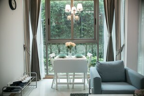 Luxury Condo, 1 Bedroom, Pool Access, Ground Floor | Desk, iron/ironing board, free WiFi, bed sheets - Bob's Thai BNB's (Chiang Mai)