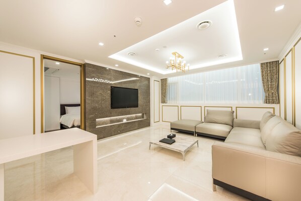 Honor Suite, 2 Bedroom | Living area | LCD TV