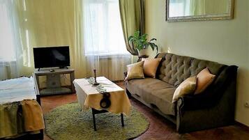 Apartment (1 Room on Rynok Sq., 16) | Living area | 32-inch LED TV with cable channels, TV