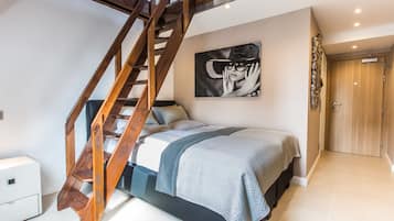 Suite Deluxe | Sábanas de algodón egipcio y ropa de cama de alta calidad