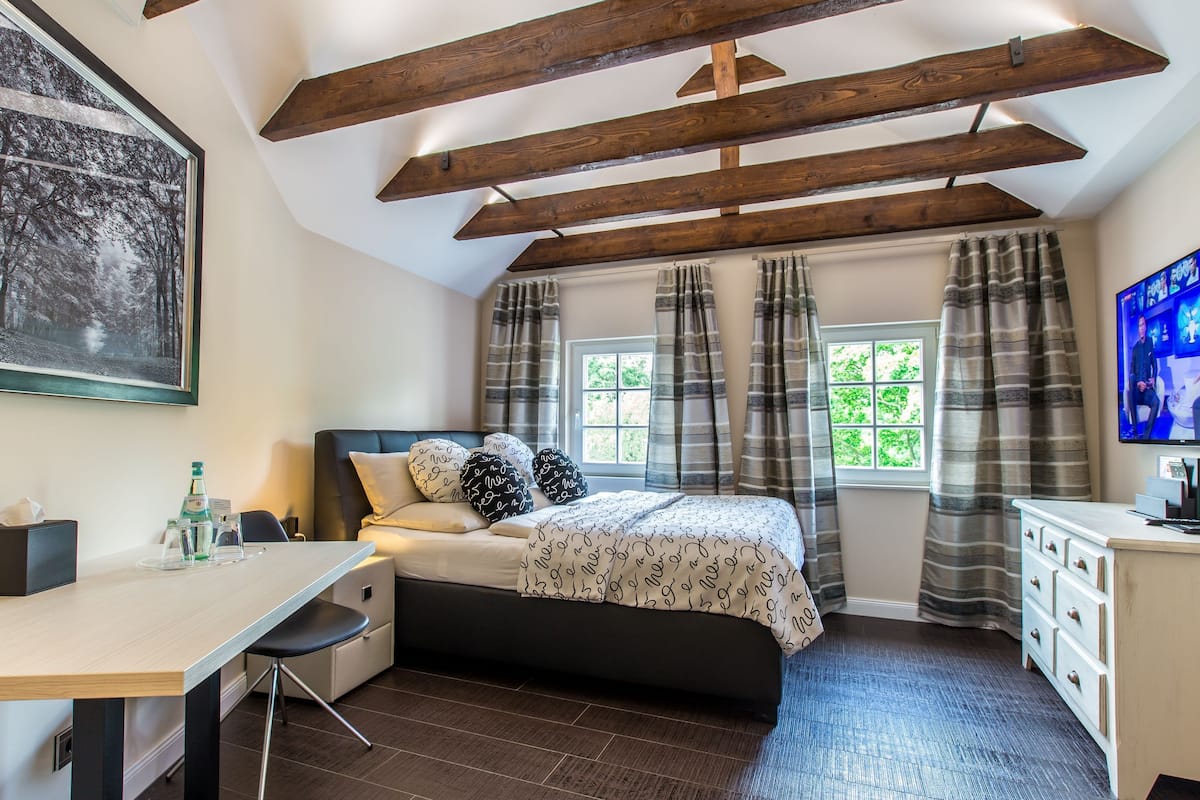 Suite Deluxe | 1 habitación, sábanas de algodón egipcio y ropa de cama de alta calidad