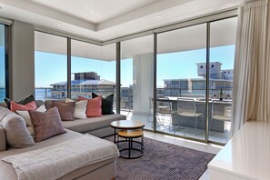 Exclusive Apartment, Ocean View | Living area | LCD TV