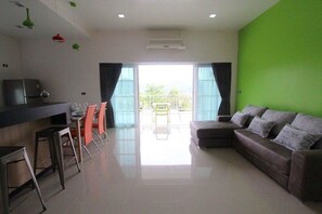 1 Bedroom Villa | Living area | 36-inch flat-screen TV with satellite channels, TV - Dwell At Chalong Hill (Chalong)