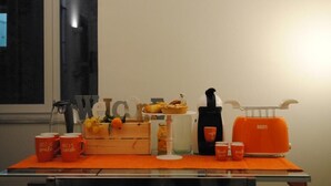 A breakfast setup with a coffee maker, toaster, and pastries on a table with a 'Welcome' sign. - Bien-Bì (Naples)
