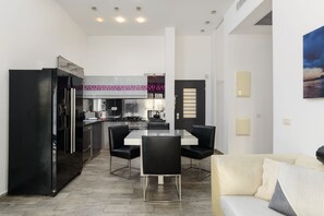 Comfort Apartment, 2 Bedrooms, Patio, Garden View | Living area | Flat-screen TV