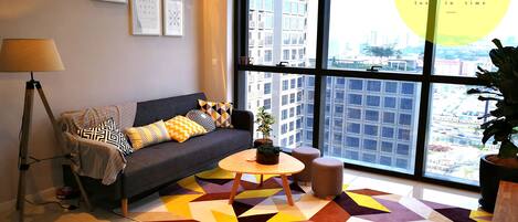 Design Apartment, 1 Bedroom, City View | Living area | 40-inch Smart TV with digital channels, TV