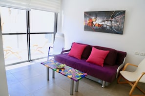 Apartment, 2 Bedrooms | Living room | 32-inch flat-screen TV with satellite channels, TV