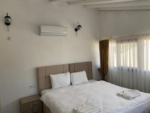 Apartamento família | Frigobar, quartos à prova de som, ferros/tábuas de passar roupa