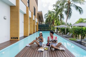 Outdoor pool, open 7:00 AM to midnight, sun loungers